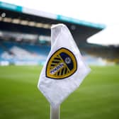 Leeds United logo on a flag.