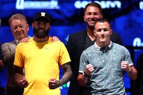 Anthony Cacace and Josh Warrington face off during the Anthony Joshua v Daniel Dubois IBF Heavyweight World Title fight announcement press conference at OVO Arena Wembley