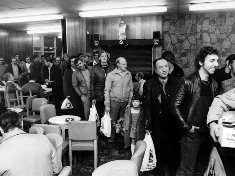 Striking miners queueing for food parcels at Sharlton Miners'  Welfare in October 1984.