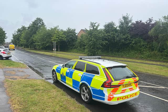 Police pictured at the scene of the crash, near Redbarn Close, Thorpe Lane, Middleton, Leeds.