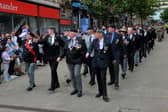 Proud veterans march for the salute in Albion Place.