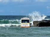 An ice cream van that has been washed out to sea, Harlyn Bay beach, North Cornwall. Images were captured of the incident at around 4pm by holidaymaker Abi Fisk, who runs Vintage Mary store. 