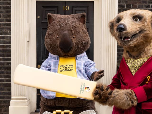 Compare the Market mascots Carl and Aleksandr appeared outside what looks remarkably like 10 Downing Street to mark the start of The Hundred.Photo released July 23 2024. 