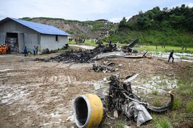 At least 18 people have been killed after a plane skidded off the runway and crashed while attempting take-off in Nepal.