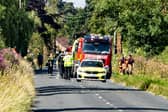 Emergency services near Thorganby, North Yorkshire, after a plane crash which killed two men (Photo by Tony Johnson)