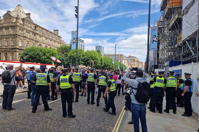 A large police presence gathered around the 150 protesters on The Headrow in Leeds on Saturday (August 3).