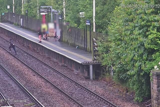 Shocking footage has showed a child jump onto rail lines as a train arrives at Bramley Station.