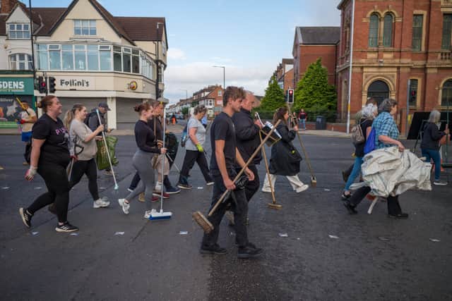 Members of the Middlesbrough community come together to clean up their streets after far-right activists destroyed property following riots on 5 August (Photo: Ian Forsyth/Getty Images)