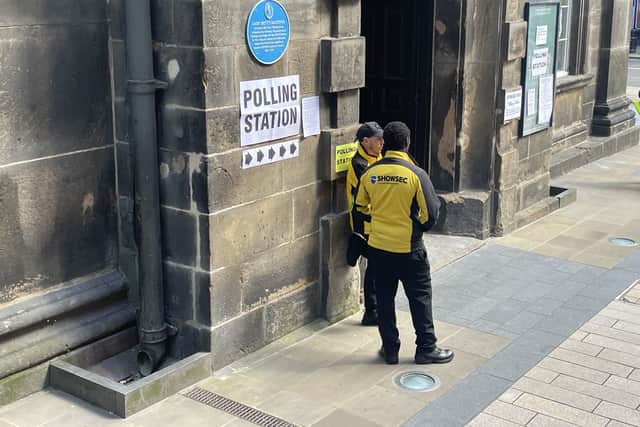 Showsec security were seen at the door of the polling station at Holy Trinity Church on Boar Lane, where the council said there could be "disruption".