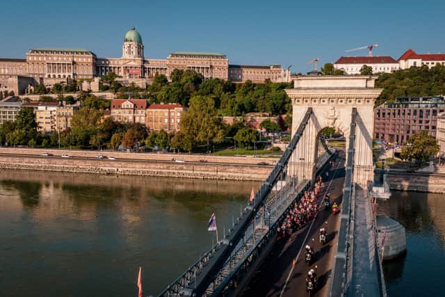 This aerial picture taken on August 26, 2023 shows athletes running across the Chain Bridge as they compete in the women's marathon final during the World Athletics Championships in Budapest