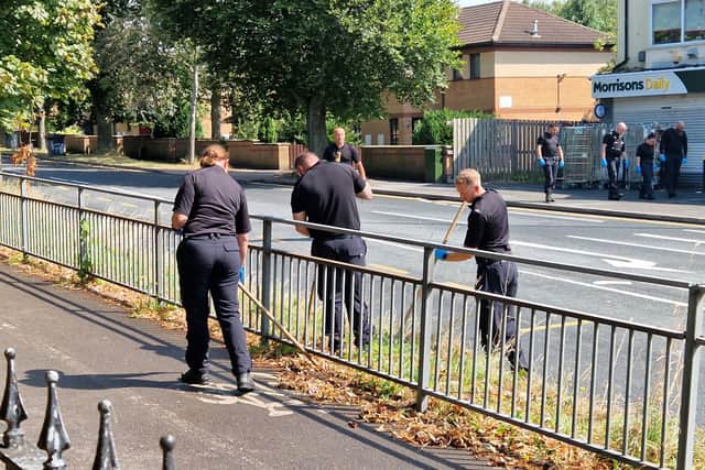 Forensic examination and specialist searches have been ongoing at the scene
