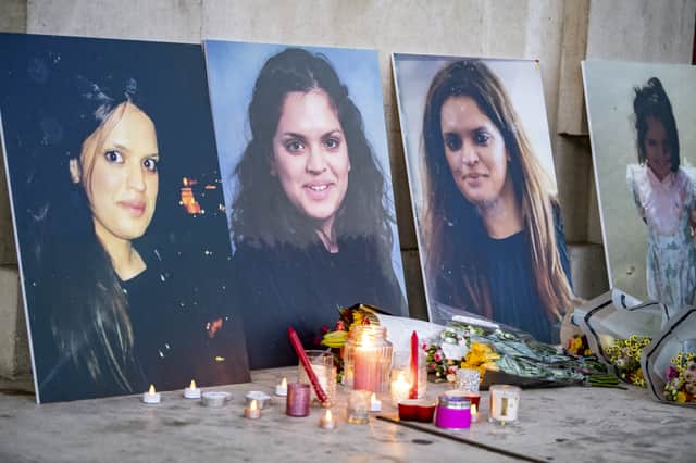 Flowers and candles were laid in tribute to Fawziyah Javed in a vigil at Leeds Civic Hall in 2022.