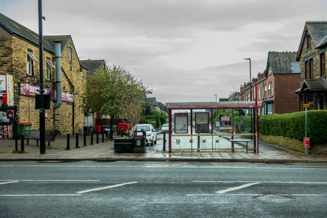 Police have launched an investigation after a man was found with head injuries at a bus stop in Chapeltown, Leeds.