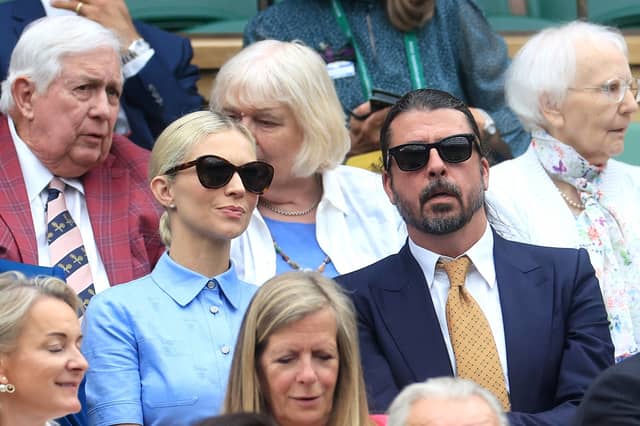 Dave Grohl, and his wife Jordyn Grohl are seen in the Royal Box at Wimbledon earlier this year