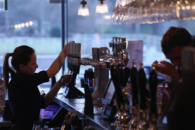 Wetherspoon is slashing prices on seven drinks next week - at more than 700 of its pubs (Photo by Oli Scarff/Getty Images)