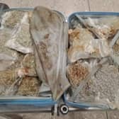 Border Force officers located five suitcases with 160 packages of cannabis in them