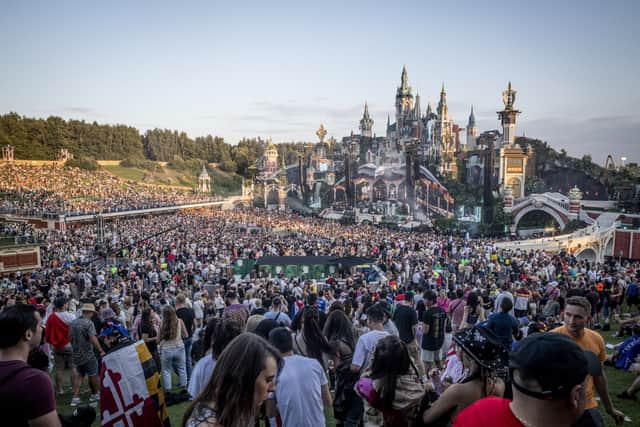 Visitors attend the first day of the Tomorrowland electronic music festival in Boom on July 21, 2023.