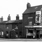 Five Lanes End at the junction of Upper Wortley Road, to the left and Oldfield Lane. Greenhill Lane, Lower Wortley Road and Dixon Lane also met here, hence the name. J. and K.D. Brown's general stores is in focus. This area was demolished and redeveloped. Pictured in March 1965.
