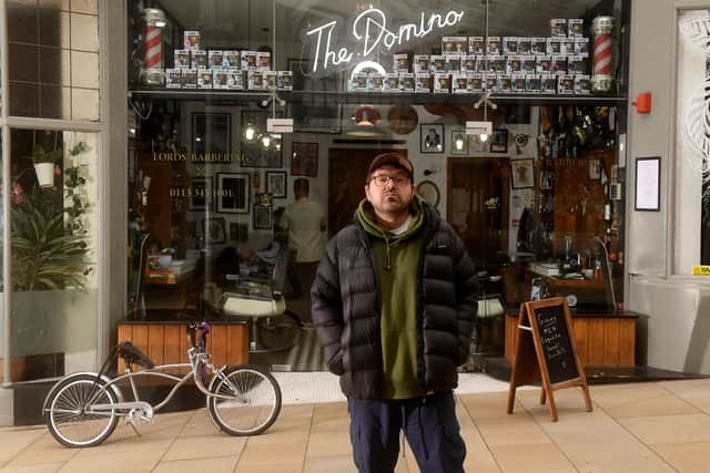 The Domino Club is “hidden” behind a Grand Arcade barbershop and hosts over 450 bands a year.