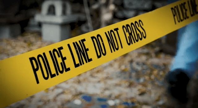 Police tape across crime scene