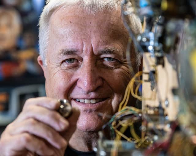 Dr Pinball Mark Squire, repairing a pinball machine at his home in Swavesey, Cambridgeshire where he fixes and restores pinball machines.
