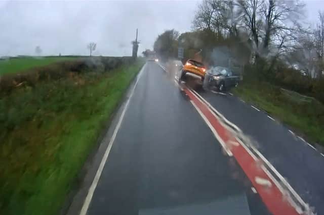 Norman Chai smashes into oncoming traffic as he loses control after overtaking a lorry.