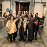 David Blackburn (centre) celebrates with other Green Party members after re-taking the Farnley and Wortley seat in a by-election