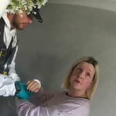 Virginia McCullough is arrested by police.