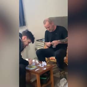 Video grab from footage as Police have mocked a group of dopey dealers who were caught after they videoed themselves bagging up illegal drugs.