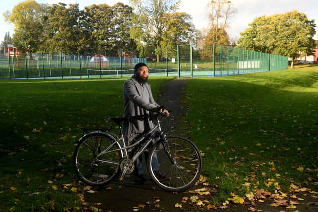Coun Mothin Ali was seen trying to stop rioters during the disorder in Harehills earlier this year