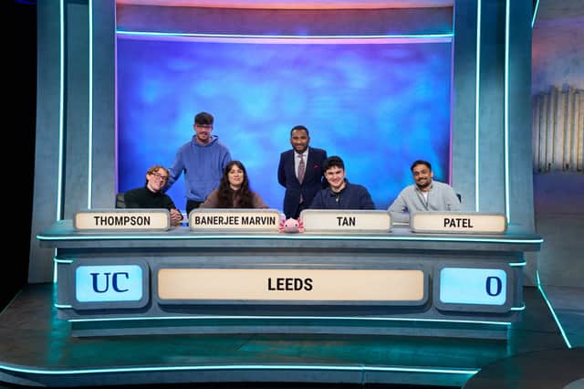The full team are pictured here with Amol Rajan and the Leeds mascot.