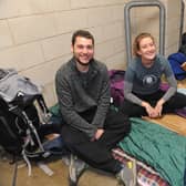 Jamie Jones-Buchanan gives a Rhinos support for James Guinan and Heather Bragg as they settle down for the night.