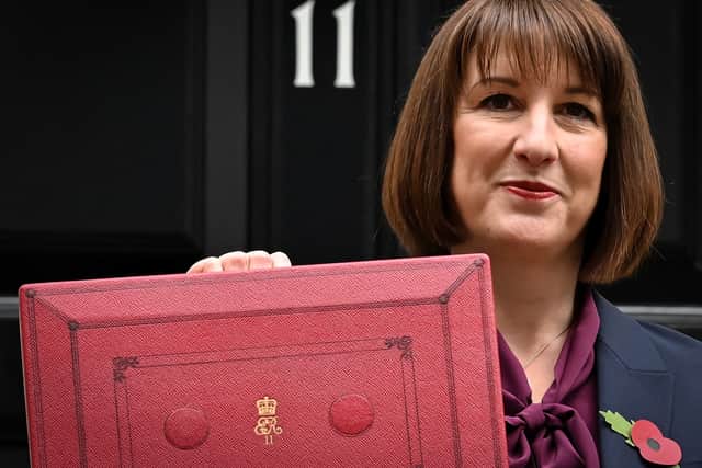 Rachel Reeves poses with the red Budget Box as she leaves 11 Downing Street to present the government's annual Autumn budget to Parliament (Photo: JUSTIN TALLIS/AFP via Getty Images)