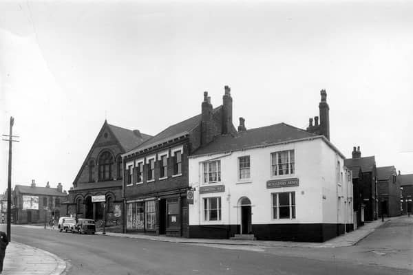 The junction of Cherry Row with Lincoln Road in August 1958. This part of Burmantofts was also known as Newtown. At the very left edge is Lincoln Field Row, then, with advertising on the side of the end property, is Lincoln Street. The building with the arched doors and windows is the old Lincoln Fields Wesleyan Methodist Sunday School, at number 6 Hill Street, located at the junction with Cherry Row and Hill Street.