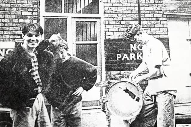 Rollercoaster pictured outside their rehearsal studios back in the day.