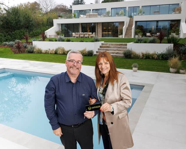 Tom and Carol Steenson Omaze Million Pound House Draw winners at their new £2m home in Devon.