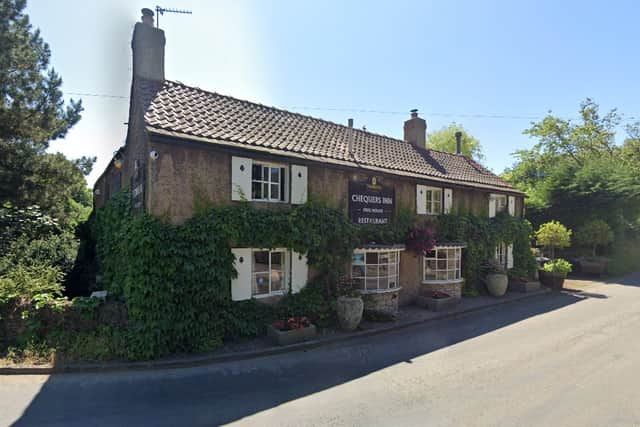 Villagers have protected the much-loved 16th century Chequers Inn pub, in Ledsham, by having it officially listed as a community asset.