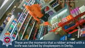 Moment brave shopkeeper fends off armed robber with a mop.