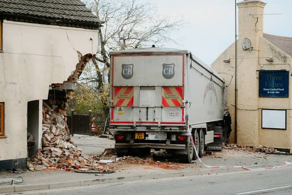 The lorry collided with the Three Fishes pub in Shrewsbury.