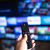 Person using an Amazon Fire TV Stick. Photo: Anna Quelhas - stock.adobe.com