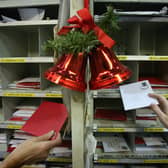 Royal Mail postal workers sort Christmas cards in the Royal Mail Regional Sorting Office in Filton (Photo: Matt Cardy/Getty Images)