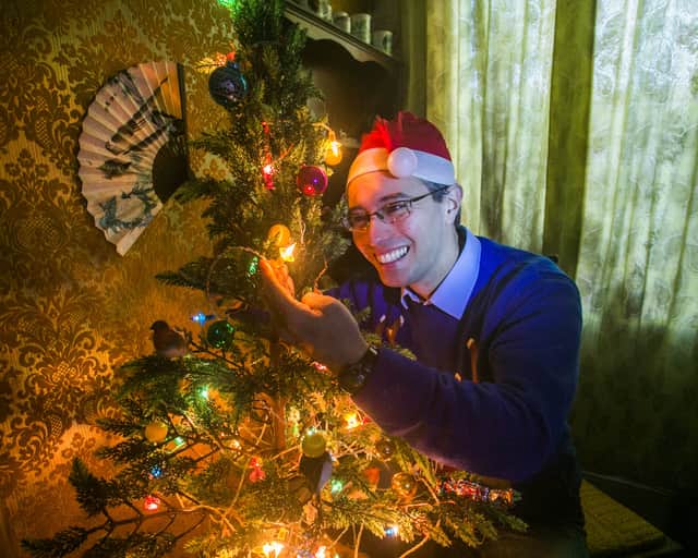 Ross Shaddick from Plymouth, Devon, with his Christmas lights which have finally gone out after 54 years.