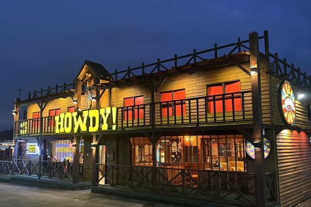 Howdy's Western-style facade is eye-catching to say the least.