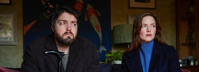 Tom Burke (L) and Holliday Grainger (R) in Strike. Photo: BBC