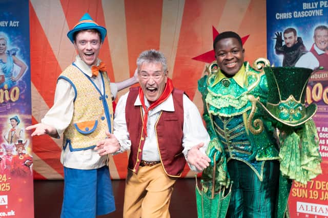 Billy Pearce with Pinocchio chracters