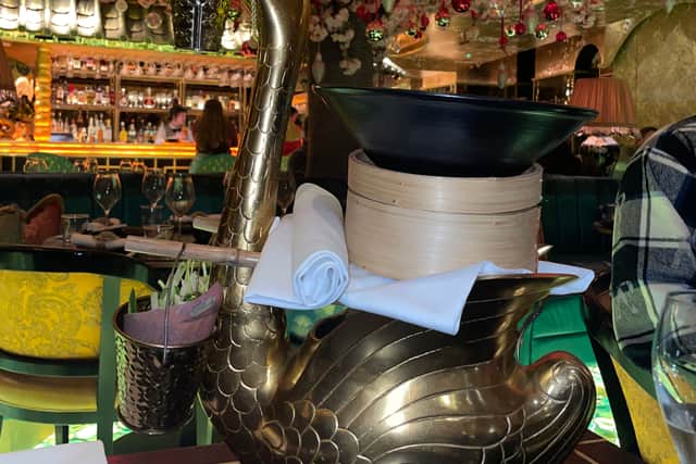 The Ivy Asia's golden aromatic half duck, for £38, arrives in a giant metallic vessel.