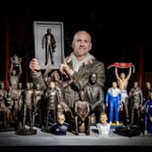 Tony Clark with his sculptures of Leeds United legends.