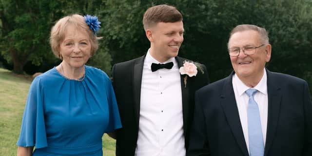 George with grandparents Jenny and Bryan.