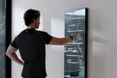 It's a smart mirror that keeps you fit with AI