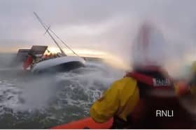 RNLI preparing to rescue passengers on a yacht